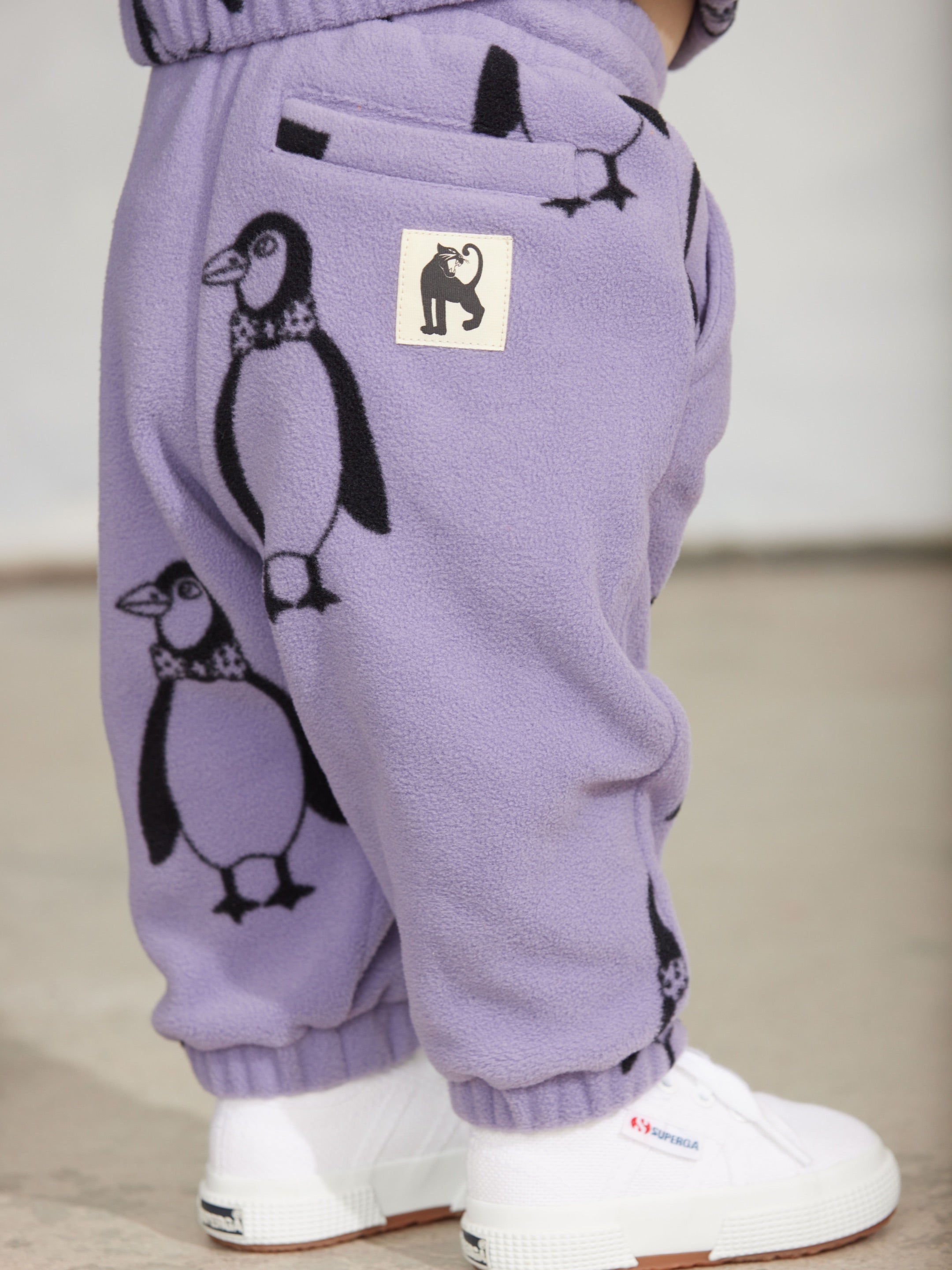 Penguin all over print fleece trousers