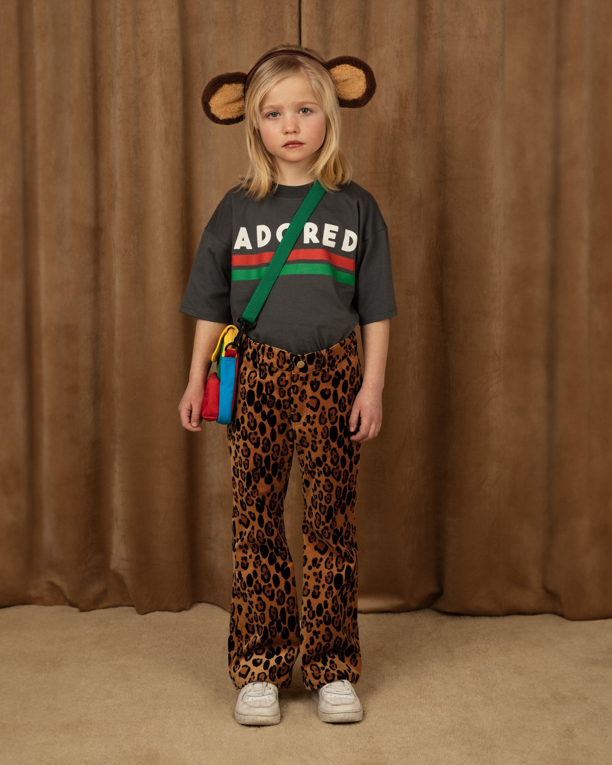 MINI RODINI - Leopard aop velvet flared trousers Faux fur jacket made from 100 % recycled polyester with a hidden zipper, two front pockets, dropped shoulders and elastic trims. Decorated with ears sewn onto the hood and an Adored embroidery in front.