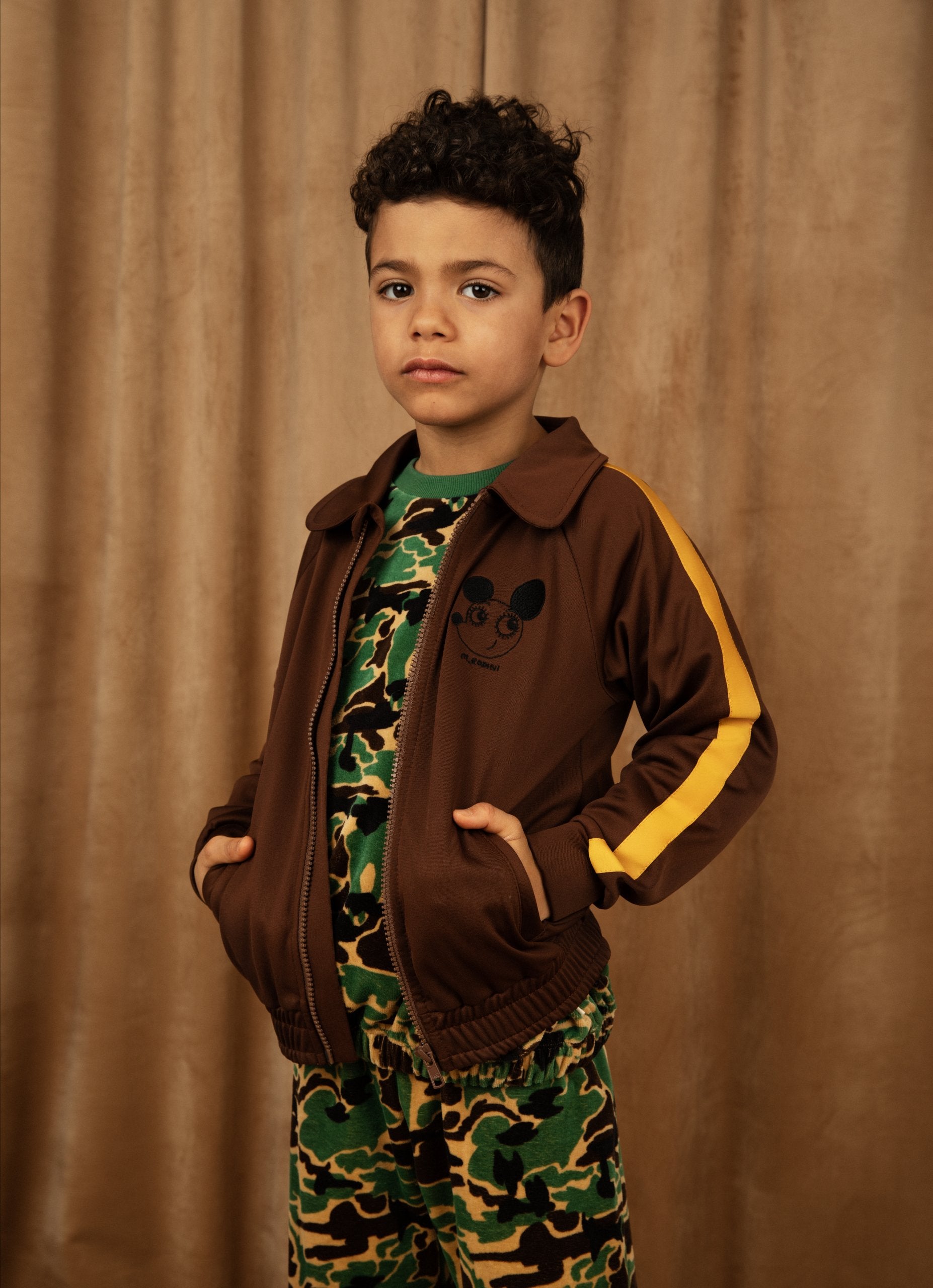 MINI RODINI - Camo aop velour trousers in green camouflage print and brown zip up tracksuit top with yellow stripe